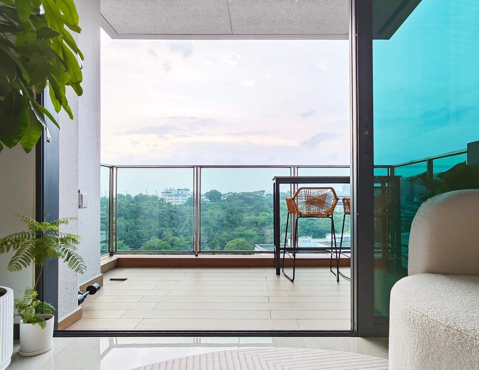 A balcony looking out over trees