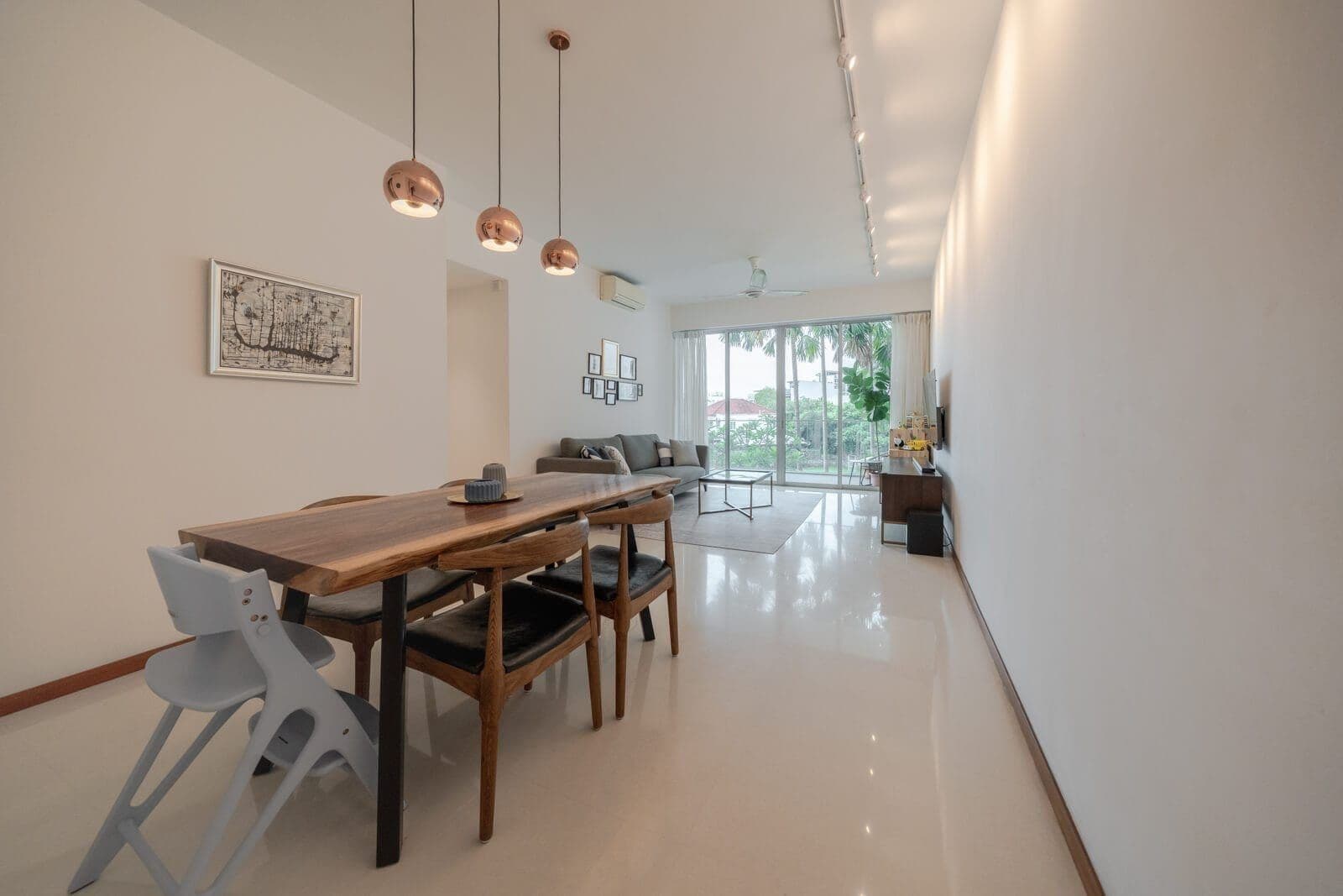 Dining and living room of a home the team sold